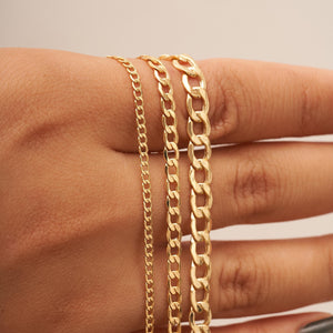 A white background showcases the 14K Real Solid Gold Miami Cuban Curb Link Chain Necklace, featuring three parallel chains with round, interlocking links and a secure lobster clasp.