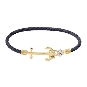 The 14K Solid Gold Unique Anchor Bracelet features a chic black twisted rope band with solid gold embellishments shaped like an anchor, along with a small ship wheel detail that adds a handcrafted nautical charm.