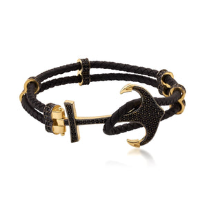 Introducing the 14K Real Solid Gold & Braided Leather Anchor Black Cord Bracelet for Men: A chic bracelet that combines a braided black leather strap with luxurious gold details, including a prominent studded anchor centerpiece. It also features a secure clasp and offers customizable chain sizing for an ideal fit.