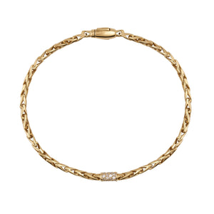 The 14K Solid Gold Diamond Pave Unique Statement Bracelet boasts a sleek design with a central section elegantly adorned with small, sparkling natural diamonds and features a secure clasp. Its polished finish ensures an elegant appearance.