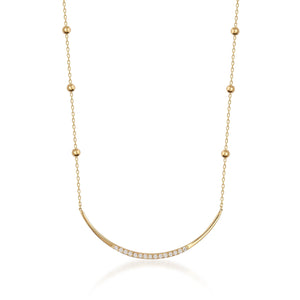 Introducing the Curved Natural Diamond Bar Necklace in 14K Solid Gold, a refined piece featuring a delicate genuine gold chain accented with evenly spaced beads. This elegant necklace exudes a minimalistic charm and includes a curved bar pendant adorned with small natural diamonds, epitomizing sustainable jewelry design.