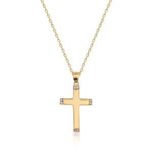 A 14K Solid Gold Diamond Cross Necklace featuring a genuine gold chain and a cross pendant. The elegantly designed cross has a smooth finish with small natural diamonds adorning each of its four ends, while the finely linked, delicate chain exemplifies sustainable jewelry craftsmanship.