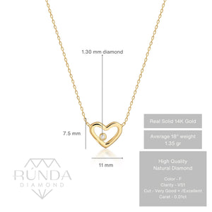 The Diamond Minimal Dainty Open Heart Necklace in 14K Solid Gold showcases a heart-shaped pendant adorned with a central diamond, gracefully suspended from a fine chain. Its delicate beauty is enhanced by the simplicity of the plain white background.