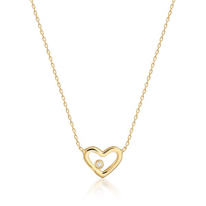 The Diamond Minimal Dainty Open Heart Necklace in 14K Solid Gold showcases a heart-shaped pendant adorned with a central diamond, gracefully suspended from a fine chain. Its delicate beauty is enhanced by the simplicity of the plain white background.