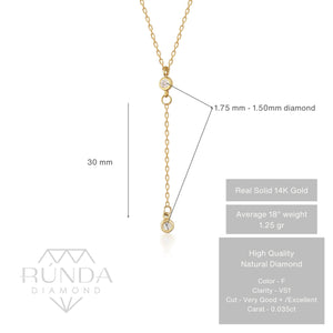 Introducing the 14K Solid Gold Diamond Lariat Y Necklace: This elegant piece showcases a delicate drop design, with two small natural diamonds encased in gold bezels. The diamonds are linked by a fine gold chain, creating a simple yet sophisticated appearance. The pendant is designed to hang vertically at the center.