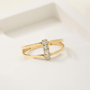 A 14K solid gold ring, named the Natural Diamond Vertical Bar Ring, features a double band design with three clear round gemstones in the center. The thin, smooth bands are adorned with decorative engravings on the sides.