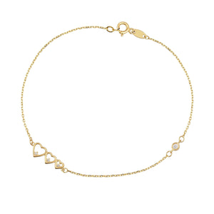 Introducing the Triple Diamond Heart Bracelet in 14K Solid Gold for Women, a delicate gold bracelet featuring a chain crafted from 14K solid gold. It is adorned with heart-shaped links and highlighted by natural diamond accents, complete with a small clasp for secure fastening.