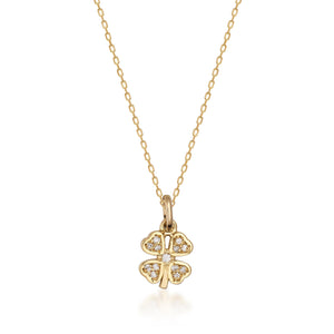 The Diamond Clover Pendant Necklace in 14K Solid Gold for Women gracefully displays a pendant shaped like a four-leaf clover, embellished with natural diamonds, suspended from a delicate chain against a white background.