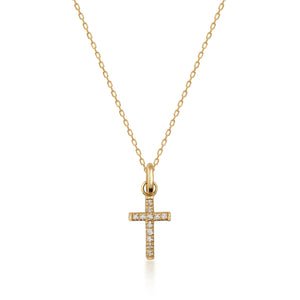 A refined necklace crafted from 14K solid gold features a small cross pendant adorned with genuine sparkling diamonds, displayed against a simple white background.