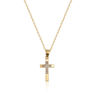 The 14K Solid Gold Diamond Tiny Cross Necklace showcases a cross pendant embellished with natural diamonds.