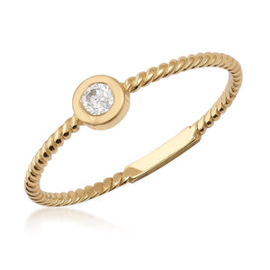 A 14K solid gold wedding band features a natural 0.11ct diamond in a bezel setting with a delicate braided design that highlights its simplicity and elegance.