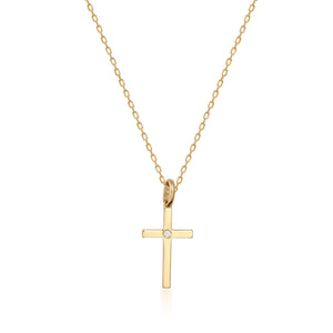 Introducing the Tiny 14K Solid Gold Diamond Cross Necklace, a delicate gold chain featuring a simple cross pendant adorned with a natural diamond at its heart. The elegant design beautifully stands out against a white background.