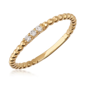 The 14K Gold Minimal Trio Stone Natural Diamond Ring showcases three small natural diamonds on a delicate beaded band.