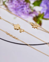 14K Gold White-Eyed Flower Diamond Bracelet