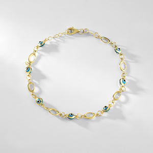 The 14K Gold Evil Eye Bracelet features a delicate design with alternating small blue evil eye charms and oval links. This elegant protection bracelet is secured with a lobster clasp.