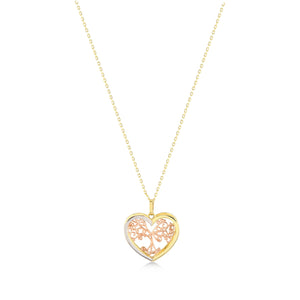 The Heart & Tree of Life Necklace features a heart-shaped pendant adorned with an intricate tree design, expertly crafted in 14K tri-tone gold. It is suspended from a delicate chain, showcasing the harmonious blend of rose and yellow gold tones against a simple white backdrop.