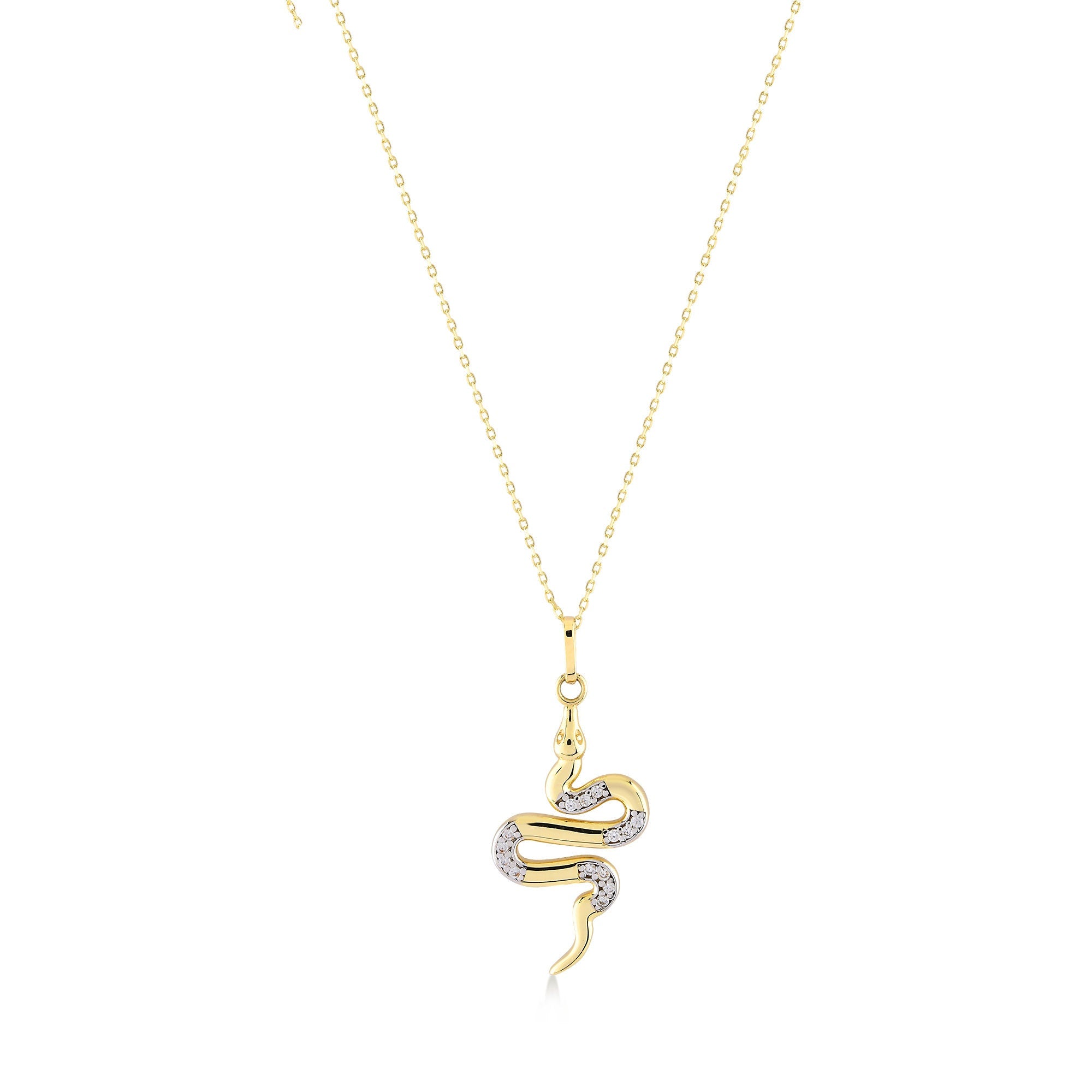 The 14K Gold Snake Necklace for Women by RundaJewelryUs features a pendant in the form of a stylized snake. Embellished with small jewels, it offers an elegantly intricate design that captivates the eye.