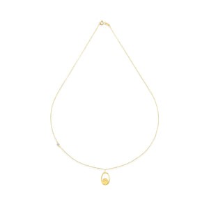 Introducing the 14K Real Gold Tree of Life Necklace: This exquisite piece showcases a delicate chain adorned with an oval-shaped pendant. Within the pendant lies a beautifully textured gold design, echoing the timeless Tree of Life motif. A small lab-created diamond accent graces one side of the chain, elegantly set against a simple white background.