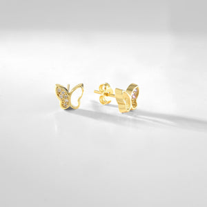 Presenting the 14K Solid Gold Butterfly Wing Stud Earrings from RundaJewelryUs, these minimalist earrings feature sparkling gemstones along the wings and a smooth, polished finish. The elegant butterfly design is complemented by a simple stud back for secure fastening.