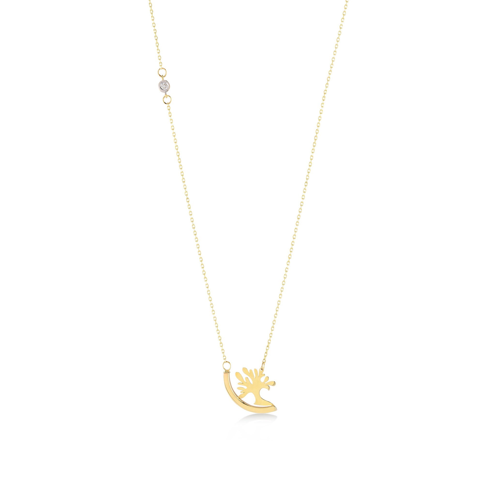 A delicate 14k Gold Tree of Life Necklace showcases a pendant shaped like a reindeer, adorned with two small crystals on its elegant chain. The stylized reindeer features a curved body and intricate antlers, while the thin chain enhances its timeless charm.