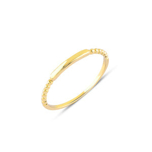 Introducing the 14K Solid Gold Minimalist Stacking Ring, a simple and elegant piece featuring a smooth, thin band with sides adorned in small, round bead-like designs. Its polished surface makes it ideal for sophisticated style and those who appreciate dainty elegance.