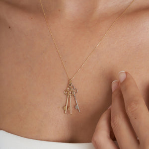 Introducing the 14K Solid Gold Friendship & Love Key Necklace, a captivating piece adorned with three elegant pendants in gold, silver, and rose gold. These graceful pendants elegantly dangle from the chain, making this exquisite necklace a perfect choice for an anniversary gift to cherish someone special.