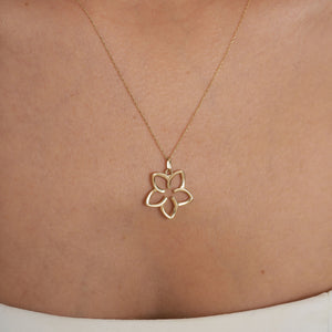 The 14K Gold Plumeria Necklace by RundaJewelryUs features a delicate pendant with a five-petal floral outline, crafted in authentic 14k gold.