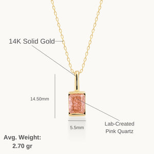 The 14K Gold Pink Rose Quartz Necklace features a rectangular pink rose quartz pendant on a delicate 14K solid gold chain, symbolizing self-love, and is showcased against a white background.