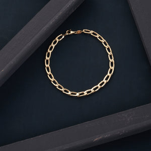 A 14K Solid Gold Curb Bracelet for Men featuring large, oval links in a symmetrical design reminiscent of Miami Cuban style, displayed on a plain white background—ideal for the trendsetter in men's fashion jewelry.