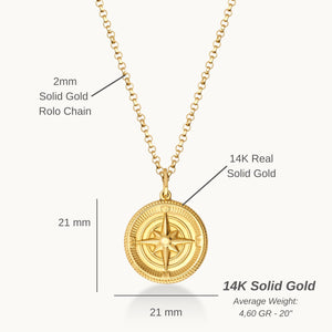 The 14K Solid Gold Compass Necklace for Men showcases a circular pendant with a raised compass design, crafted from solid gold. Its textured edges and polished finish add elegance, while it gracefully hangs on a delicate chain.