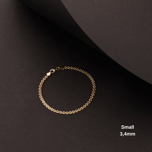 Displayed on a white background, the 14K Real Solid Gold Bismarck Chain Bracelet for Men features an intricate design of interwoven chain links with a polished clasp, creating a textured appearance ideal for unisex jewelry.