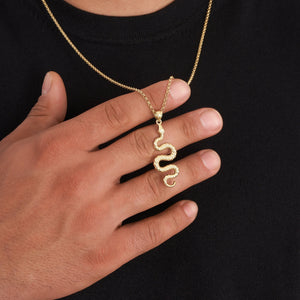 This 14K Solid Gold Serpent Pendant Necklace features an intricately designed snake pendant in an S-shape with a textured finish, elegantly suspended from a fine chain. It's an ideal piece of animal-themed jewelry for those who admire distinctive artistry.