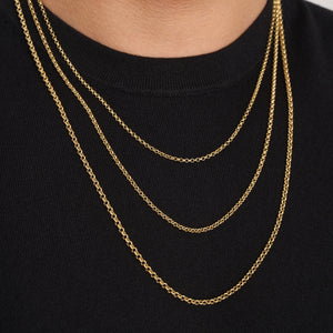 The 14K Solid Rolo Cable Link Chain Necklace for Men features a sleek design with small, round links in a consistent pattern, creating a complete loop. Set against a plain white background, this gold chain epitomizes minimalist elegance.