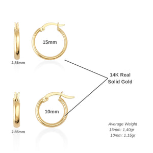 A set of radiant 14K solid gold hoop earrings for men, featuring one earring shown from the side and the other displayed open to showcase its clasp. These meticulously handcrafted pieces offer a smooth and polished finish, effortlessly merging elegance with timeless style.