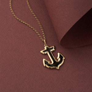 The 14K Solid Gold Anchor Pendant Necklace for Men offers a sailor's gift of elegance, featuring a striking anchor pendant filled with black enamel against a plain white background.