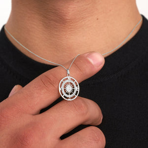 The 14K Solid Gold Compass Necklace for Men makes an ideal graduation gift, with its pendant showcasing a compass design. It features intricate engravings and a central compass rose shape resembling a North Star, elegantly suspended on a fine chain.