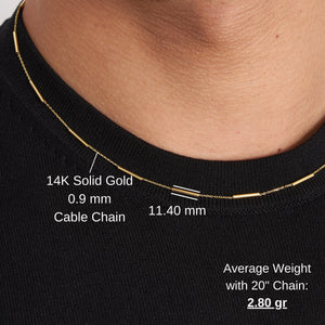 The 14K Solid Gold Bar Station Chain Necklace for Men features minimalist cylindrical bead accents evenly spaced along the fine chain, creating a simple and elegant circular design.