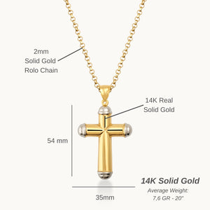 A 14K Solid Gold Cross Necklace for Men elegantly hangs on a gold chain against a white background. The cross, showcasing rounded silver tips at each end, exudes a sleek and polished appearance, ideal for those in search of Christian-Inspired Accessories.