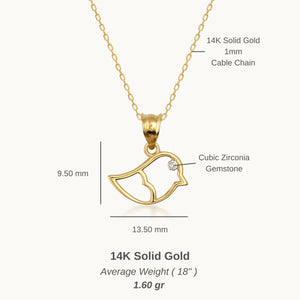 The 14K Solid Gold Bird Necklace, featuring a diamond eye, glistens on its delicate chain against a white background, showcasing the elegance of fine gold jewelry.