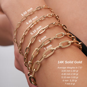 Displayed against a plain white background are five horizontal rows of gold chains, each embodying the elegance of fancy Italian design. Crafted using sustainable methods by RundaJewelryUs, these chains feature oval-shaped links in varying sizes and styles, including the refined 14K Real Solid Gold Paperclip Chain Bracelet.