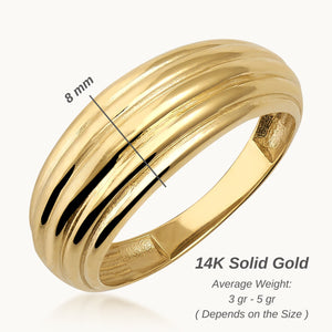 Introducing the 14K Solid Gold Ribbed Dome Graduating Ring, this exquisite piece boasts a lustrous polished finish and a distinctive triple ridge design on the band, showcasing its chunky gold elegance against a white background.